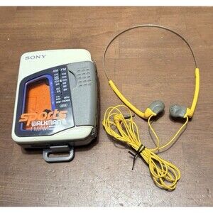 Sony Sports Walkman FM/AM Cassette Player WM-FS399 w/headphones **working**